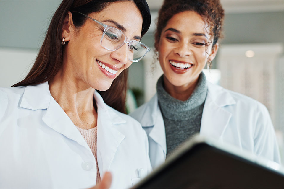 ophthalmologist reviewing eye exam results with a patient
